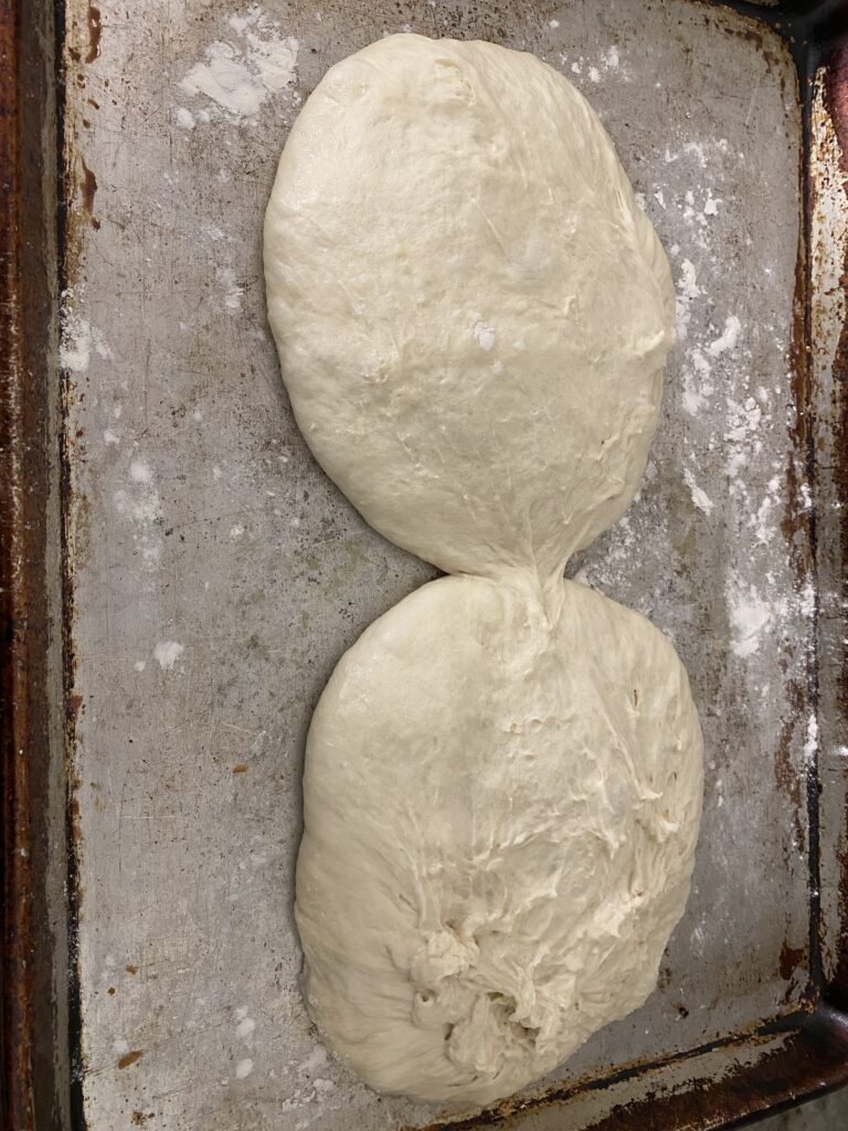 Pizza Dough Split in 2 After Resting