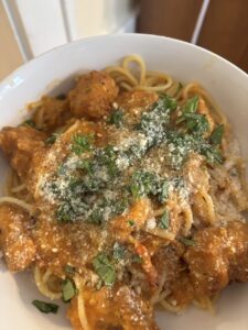 Garden tomato and pepper fried chicken pasta with basil and parmesan